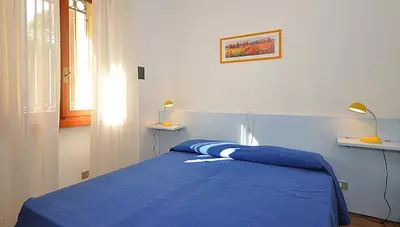 Taliansko-Bibione-Lido-del-Sole - Villa-Friuli - apartmán B2+2 - spálňa Taliansko-Bibione-Lido-del-Sole - Villa-Friuli - apartmán B2+2 - spálňa