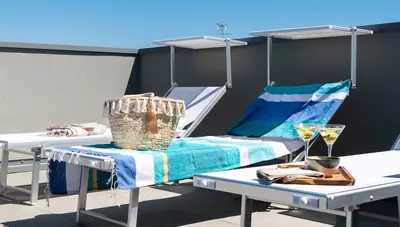 Taliansko - Bibione - Apartmány One Life Suites - strecha solárium Taliansko - Bibione - Apartmány One Life Suites - strecha solárium