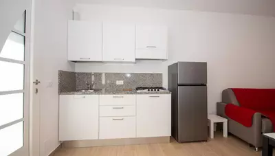 Taliansko-Bibione-Lido-del-Sole-Villa-Friuli-apt.B+ 2+2-kuchyňa Taliansko-Bibione-Lido-del-Sole-Villa-Friuli-apt.B+ 2+2-kuchyňa