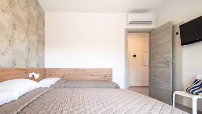 Taliansko - Bibione - Apartmány One Life Suites - typ C5+2 - spálňa Taliansko - Bibione - Apartmány One Life Suites - typ C5+2 - spálňa